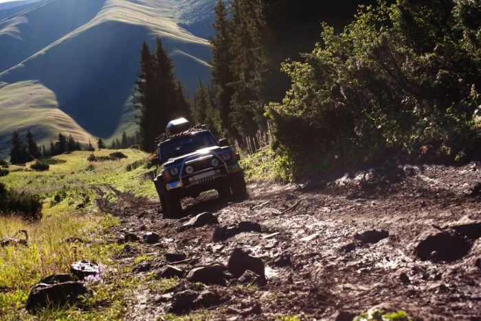 4x4 driving over rocky road in mountians