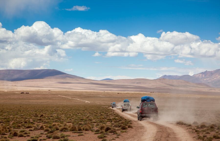 SUVs driving in the desert