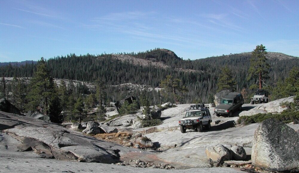 SUVs driving on rocks