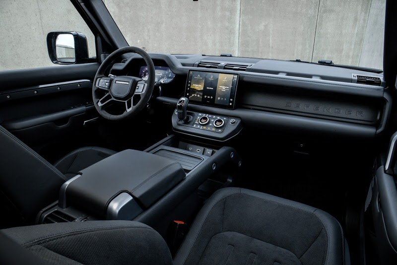 Interior dashboard with black leather seats and and large touch screen