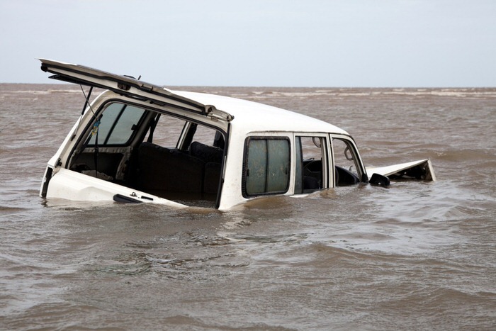 SUV submerged in water