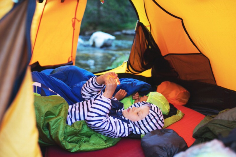 Kids in a tent camping