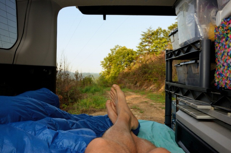 man resting in a camper