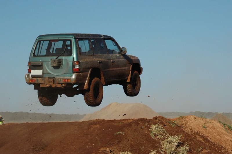 4x4 in the air after launching over a hill