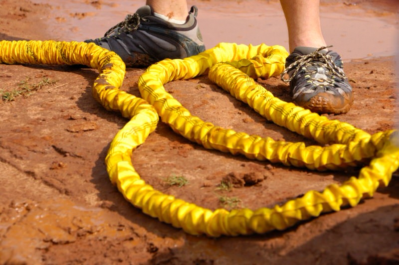 person standing near yellow rope