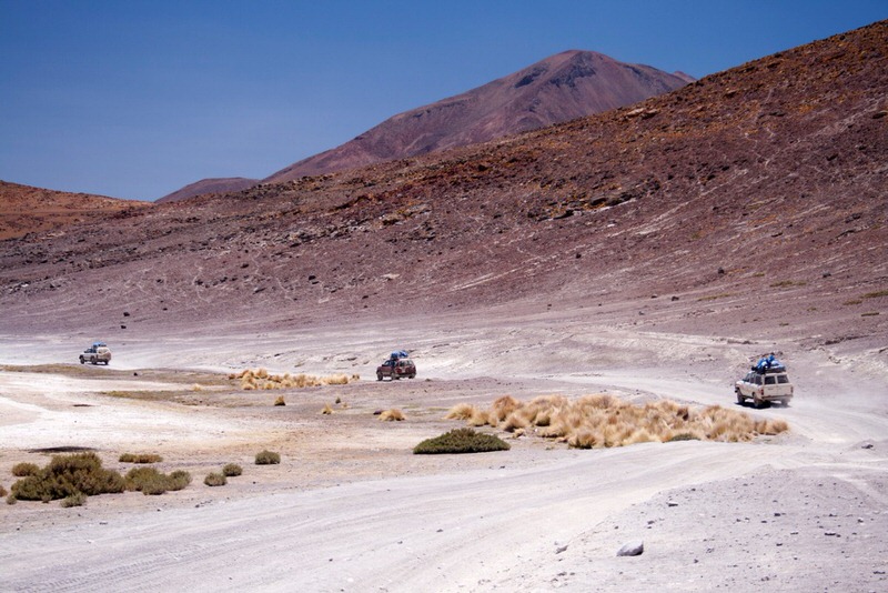 group of SUVs in a desert