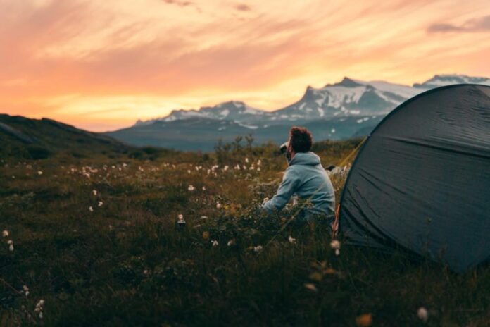 man enjoying a Successful Solo Camping Trip