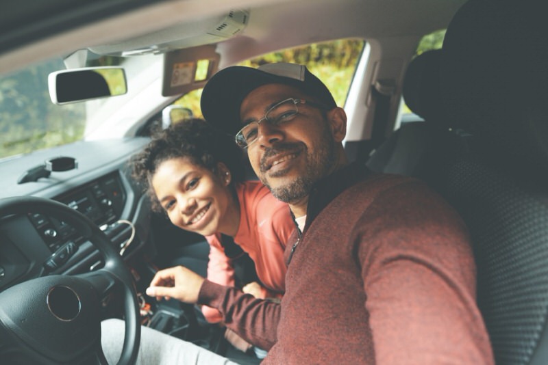 two people in a car