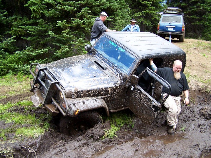 4x4 Recovery Mistakes Man Standing By the Vehicle