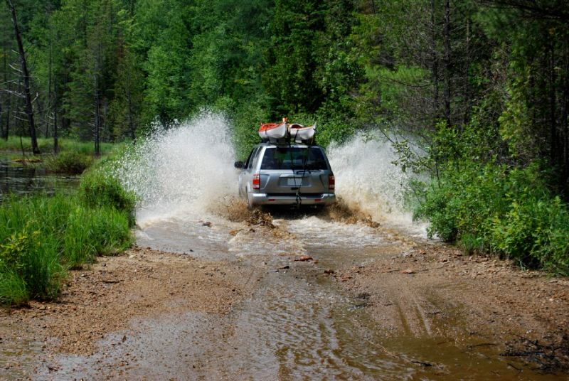 4x4 driving though a river