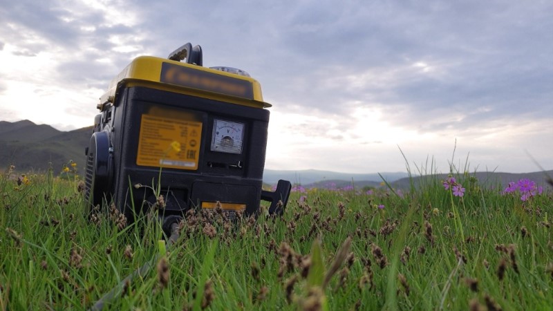 Generator in the grass