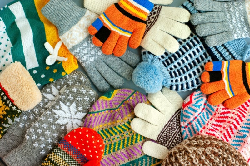 lots of mittens and gloves for cold weather camping
