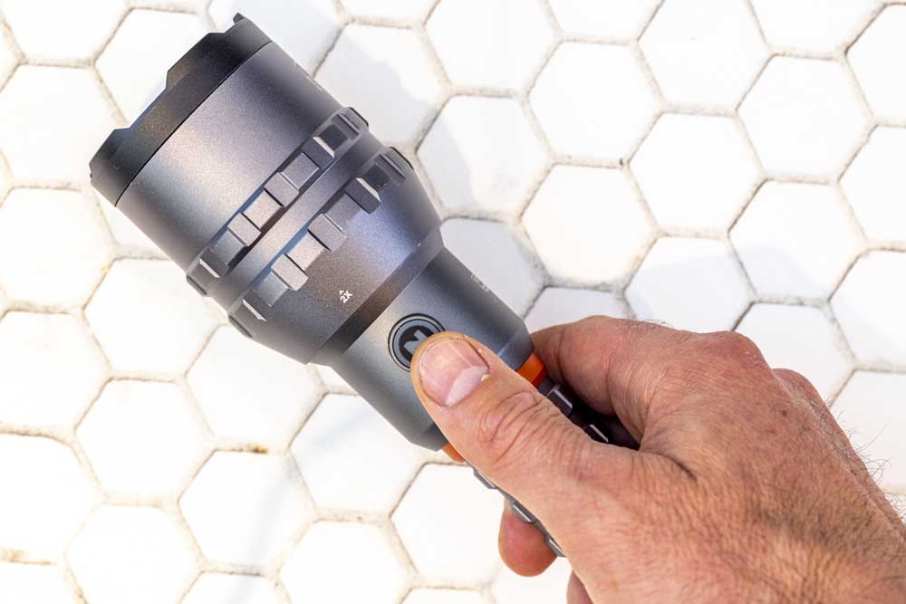nebo flashlight in the hand - NEBO Flashlight Review