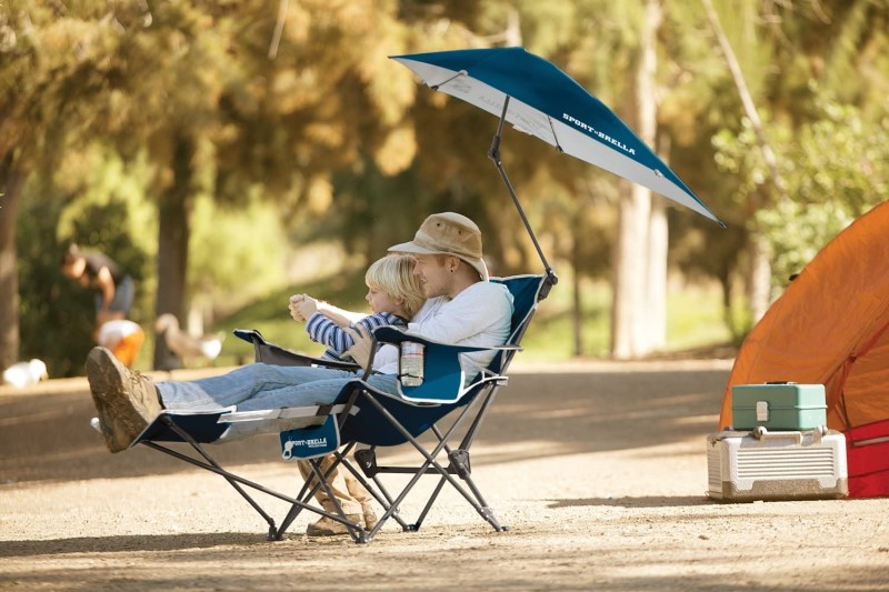 family relaxing in a camping chair