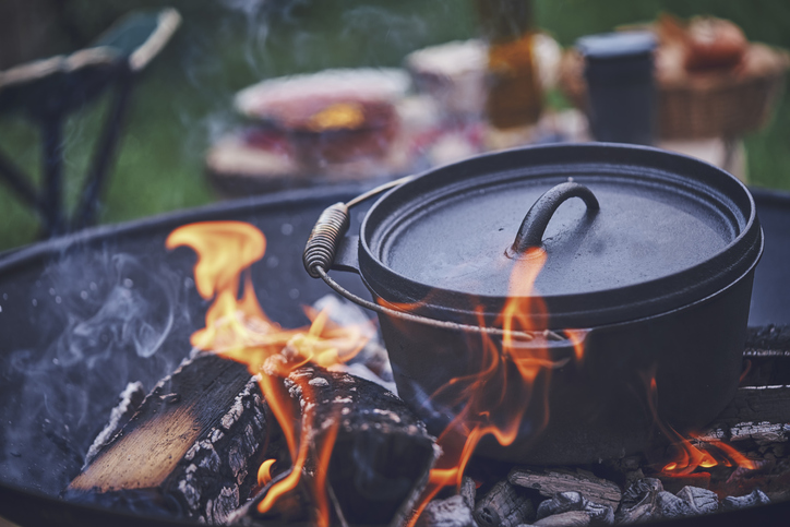 Cooking over a campfire in a Dutch oven