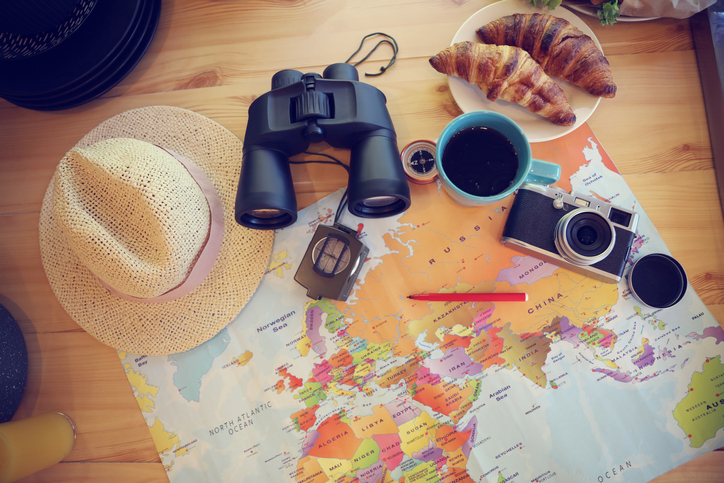 Map and travel items on a table