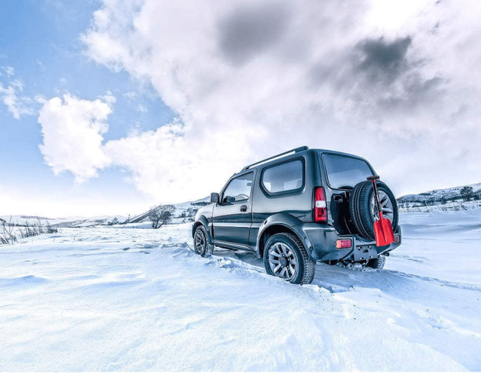 Collapsible Snow Shovel on an SUV