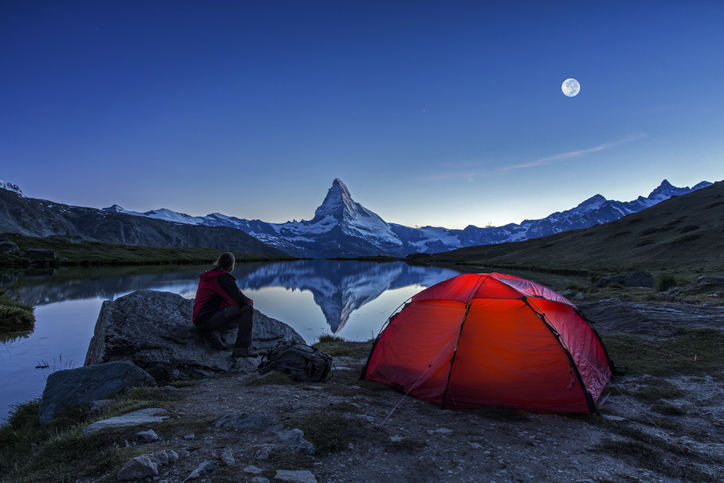 Camper under full Moon at Matterhorn