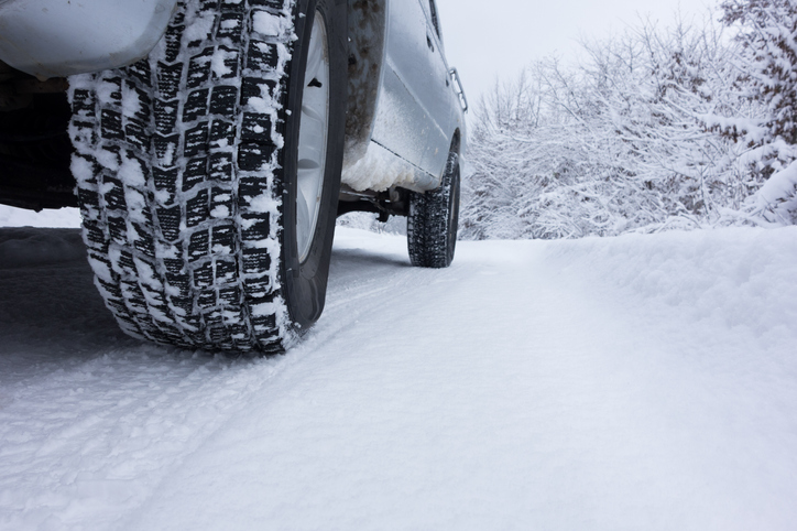 Winter Tire on snow covered road.