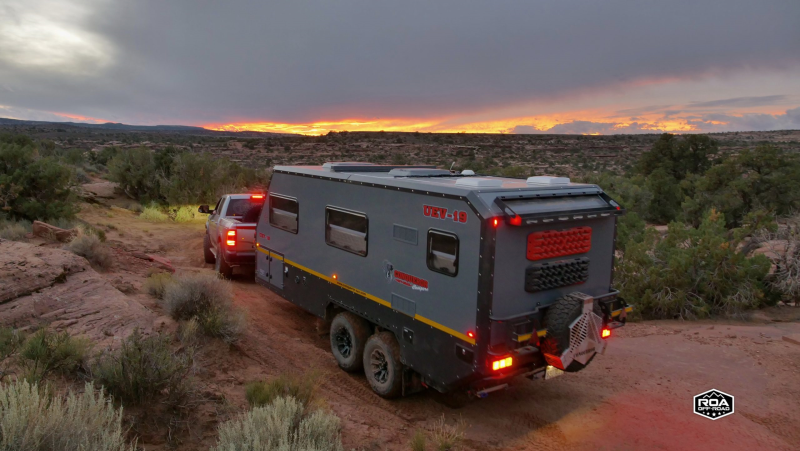 Conqueror Off Road Campers UEV 19 Driving At Sunset