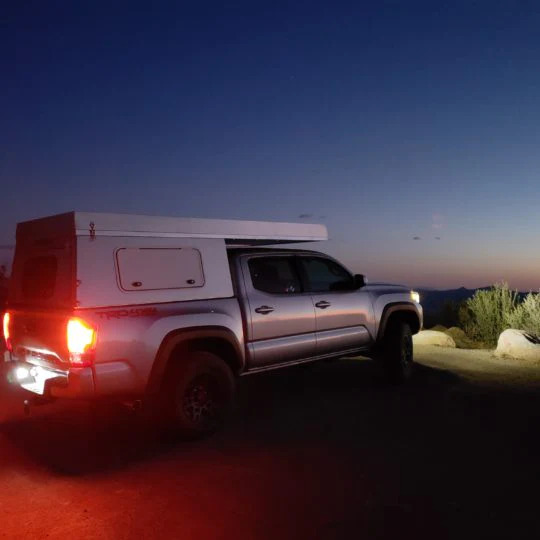 AT Overland Summit Truck Topper Tacoma At Night