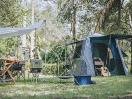 camping setup summer camping setup summer with tent, table, chair and guitar, tent, table, chair and cooking utensil