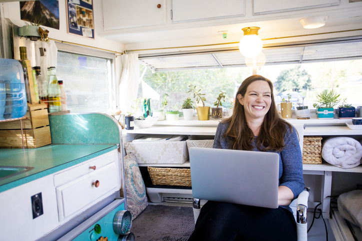 Young woman working from her RV