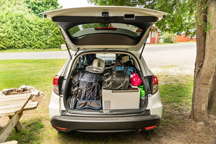 car overpacked with camping gear