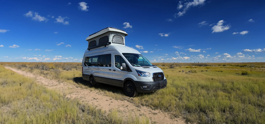 Ford Transit 250 HR Campervan in a field