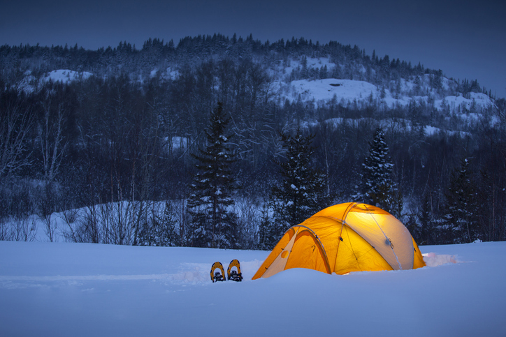 Winter camping under in a tent