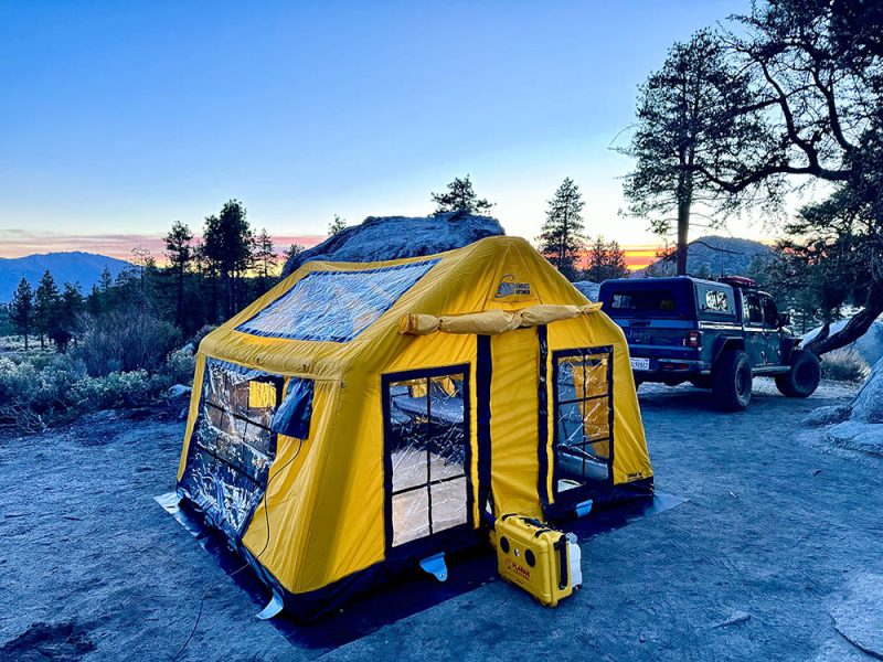 planar with tent at dusk