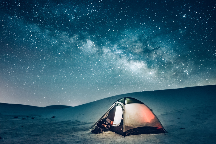 Camping tent under the milky way at White Sands National Monument in New Mexico.