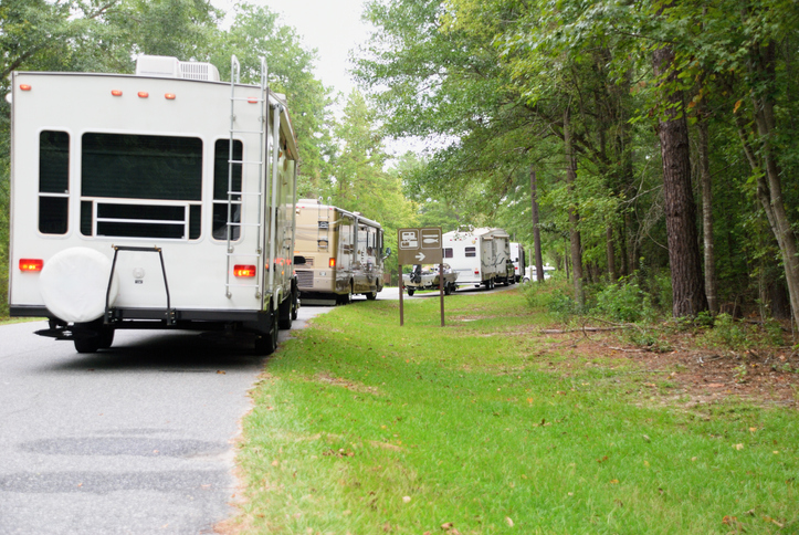 Line of recreational vehicles in public campground
