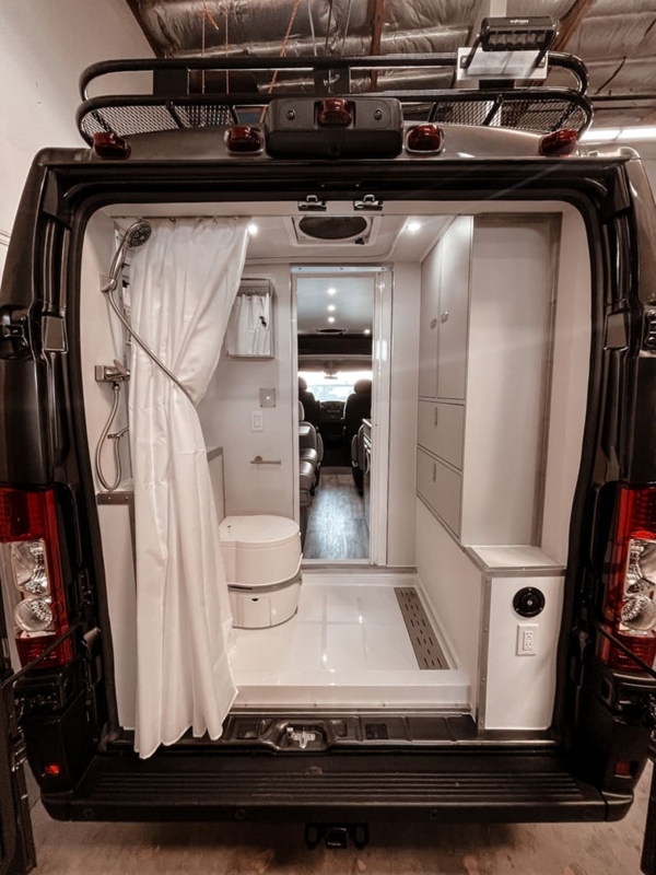 Large Bathroom in a Ram ProMaster van by Camplife Customs
