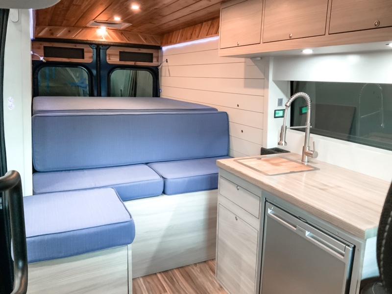 Sink and storage of a Ram ProMaster van by Camplife Customs