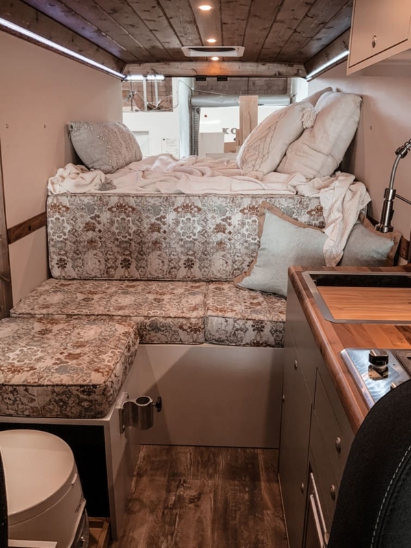 seating area in a Ram ProMaster van by Camplife Customs
