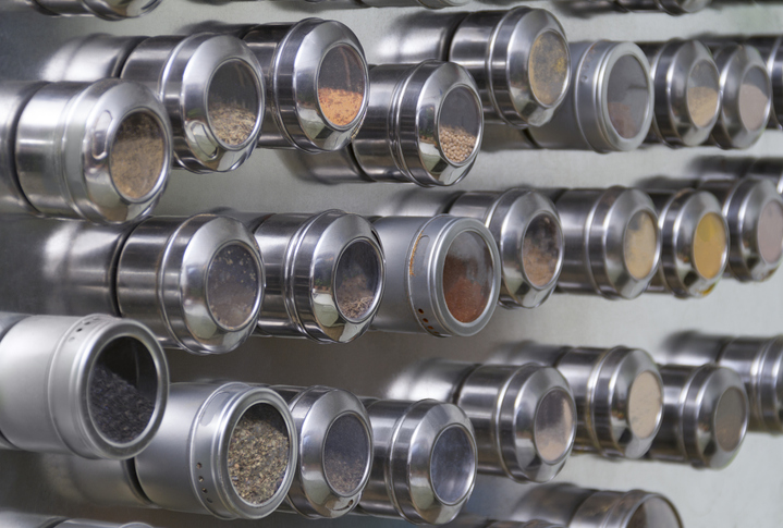 magnetic spice cans at a reflective wall