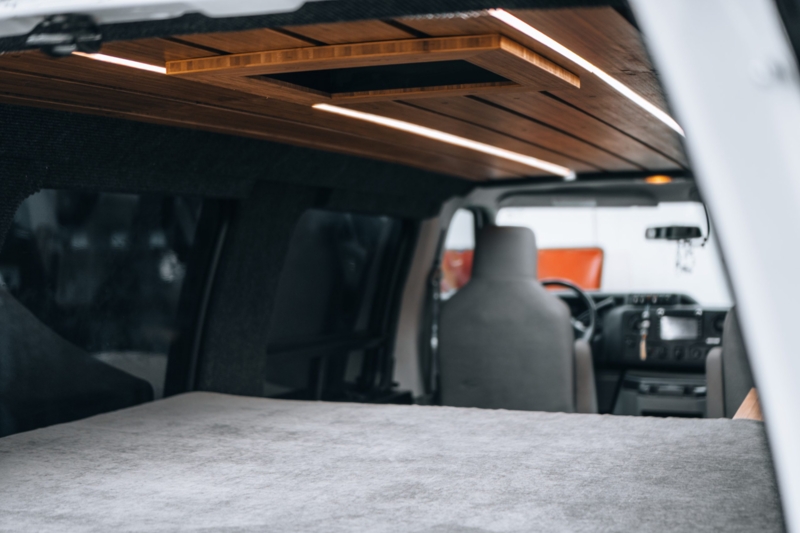 Camplife Customs Ford E-350 Extended Van Interior ceiling and grey carpet